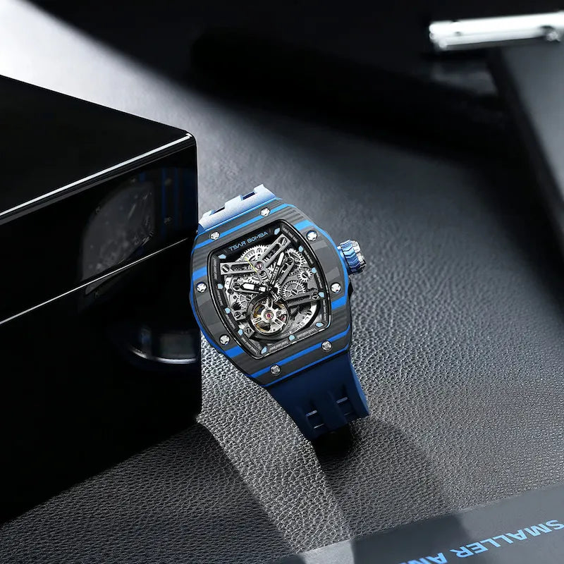 TSAR BOMBA Atomic TB8218CF; automatic skeleton carbon fiber men interchangeable watch carbon fiber set. Set inclues 1 automatic core and 2 fluororubber and 3 carbon fiber bezel an d 5 strap and 5crown. The TB8218CF(5-IN-1) Fractures carbon fiber bezel and case.Blue carbon fiber bezel and fluororubber strap