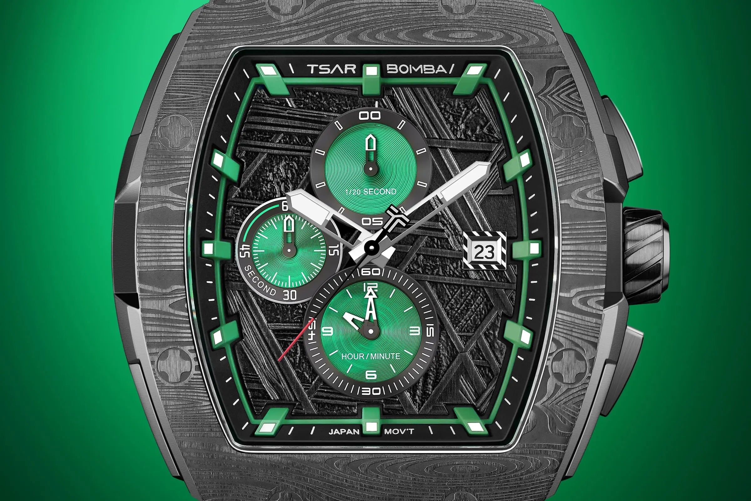  TSAR BOMBA Elemental TB8211Q Stainless Steel Tonneau Chronograph Watch. Features a stainless steel case and a precision-machined quartz movement. The textured dial integrates date display and chronograph function. A 1/20th-second counter is located at 12 o'clock, the date display at 3 o'clock, the hour/minute counter at 6 o'clock, and the seconds counter at 9 o'clock.--dial-display