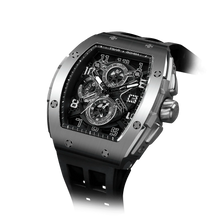 The TSAR BOMBA Elemental TB8211Q Stainless Steel Tonneau Chronograph Watch. Features a stainless steel case and a Seiko quartz movement. The multi-layered skeleton dial combines date display and chronograph functions. A 1/20th-second chronograph subdial is located at 12 o'clock, the date display at 3 o'clock, the hour/minute chronograph subdial at 6 o'clock, and the chronograph seconds subdial at 9 o'clock.-- Left three-quarter view
