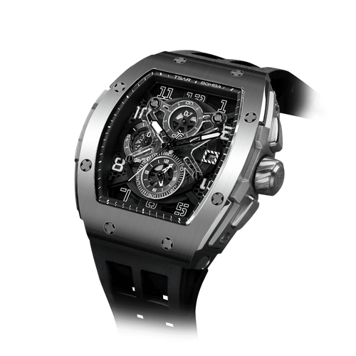 The TSAR BOMBA Elemental TB8211Q Stainless Steel Tonneau Chronograph Watch. Features a stainless steel case and a Seiko quartz movement. The multi-layered skeleton dial combines date display and chronograph functions. A 1/20th-second chronograph subdial is located at 12 o'clock, the date display at 3 o'clock, the hour/minute chronograph subdial at 6 o'clock, and the chronograph seconds subdial at 9 o'clock.-- Left three-quarter view