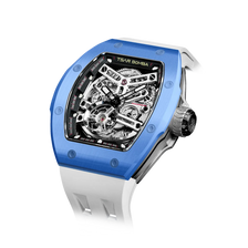 TSAR BOMBA Atomic TB8218C automatic skeleton tonneau men watch; ceramic bezel and stainless steel case and fluororubber strap; Features a ceramic bezel and an interchangeable fluoro-rubber strap. Utilizes TSAR BOMBA’s patented technology for interchangeable straps, bezels, and crowns. Quickly swap modules without tools—since your watch can change its style, why buy another one? Left three-quarter angle view-- Blue