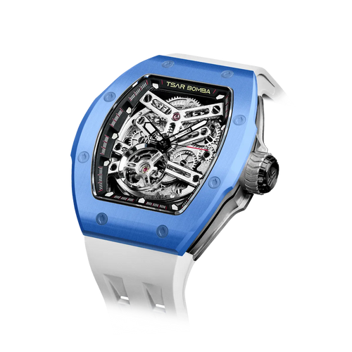 TSAR BOMBA Atomic TB8218C automatic skeleton tonneau men watch; ceramic bezel and stainless steel case and fluororubber strap; Features a ceramic bezel and an interchangeable fluoro-rubber strap. Utilizes TSAR BOMBA’s patented technology for interchangeable straps, bezels, and crowns. Quickly swap modules without tools—since your watch can change its style, why buy another one? Left three-quarter angle view-- Blue