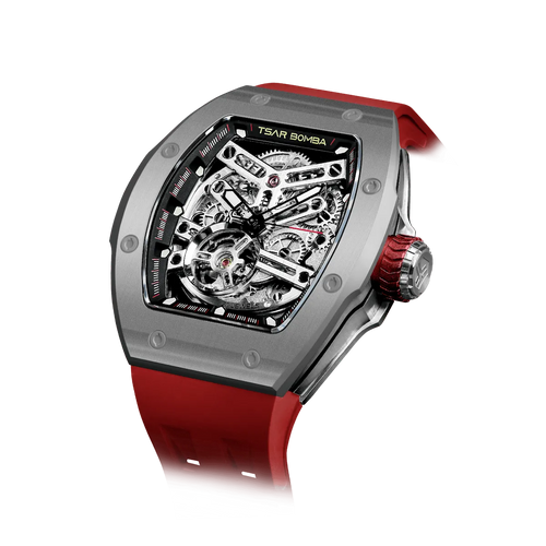 TSAR BOMBA Atomic TB8218C automatic skeleton tonneau men watch; ceramic bezel and stainless steel case and fluororubber strap; Features a ceramic bezel and an interchangeable fluoro-rubber strap. Utilizes TSAR BOMBA’s patented technology for interchangeable straps, bezels, and crowns. Quickly swap modules without tools—since your watch can change its style, why buy another one? Left three-quarter angle view-- Grey Red