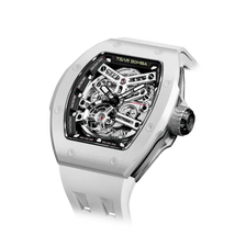 TSAR BOMBA Atomic TB8218C automatic skeleton tonneau men watch; ceramic bezel and stainless steel case and fluororubber strap; Features a ceramic bezel and an interchangeable fluoro-rubber strap. Utilizes TSAR BOMBA’s patented technology for interchangeable straps, bezels, and crowns. Quickly swap modules without tools—since your watch can change its style, why buy another one? Left three-quarter angle view-- white