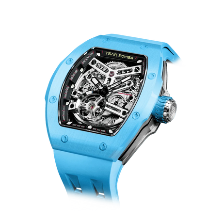 TSAR BOMBA Atomic TB8218C automatic skeleton tonneau men watch; ceramic bezel and stainless steel case and fluororubber strap; Features a ceramic bezel and an interchangeable fluoro-rubber strap. Utilizes TSAR BOMBA’s patented technology for interchangeable straps, bezels, and crowns. Quickly swap modules without tools—since your watch can change its style, why buy another one? Left three-quarter angle view-- sky blue
