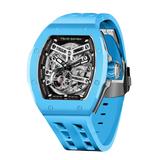 TSAR BOMBA Atomic TB8218C automatic skeleton tonneau men watch; ceramic bezel and stainless steel case and fluororubber strap; Features a ceramic bezel and an interchangeable fluoro-rubber strap. Utilizes TSAR BOMBA’s patented technology for interchangeable straps, bezels, and crowns. Quickly swap modules without tools—since your watch can change its style, why buy another one? Left three-quarter view-- sky blue