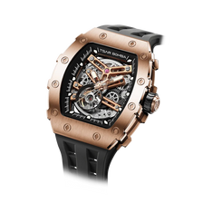 The TSAR BOMBA TB8208A tonneau skeleton watch, Angled front view, features a rose gold stainless steel case, exposed mechanical movement, and a black strap. A tourbillon is visible at 7 o'clock.