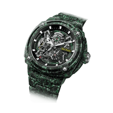 TSAR BOMBA Electron TB8401CF Men’s Watch. Crafted entirely from carbon fiber—including the strap—it weighs just 100 grams. The skeleton dial design offers a direct view of the movement, allowing you to appreciate the charm of precision mechanics in action. Powered by a Citizen MIYOTA movement. The Electron-TB8401CF features Grade A luminescent coating, scratch-resistant sapphire crystal, and an interchangeable fluororubber strap. Water-resistant to 100 meters (10 ATM).Left three-quarter view