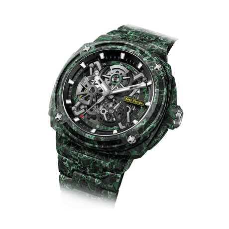 TSAR BOMBA Electron TB8401CF Men’s Watch. Crafted entirely from carbon fiber—including the strap—it weighs just 100 grams. The skeleton dial design offers a direct view of the movement, allowing you to appreciate the charm of precision mechanics in action. Powered by a Citizen MIYOTA movement. The Electron-TB8401CF features Grade A luminescent coating, scratch-resistant sapphire crystal, and an interchangeable fluororubber strap. Water-resistant to 100 meters (10 ATM).Left three-quarter view