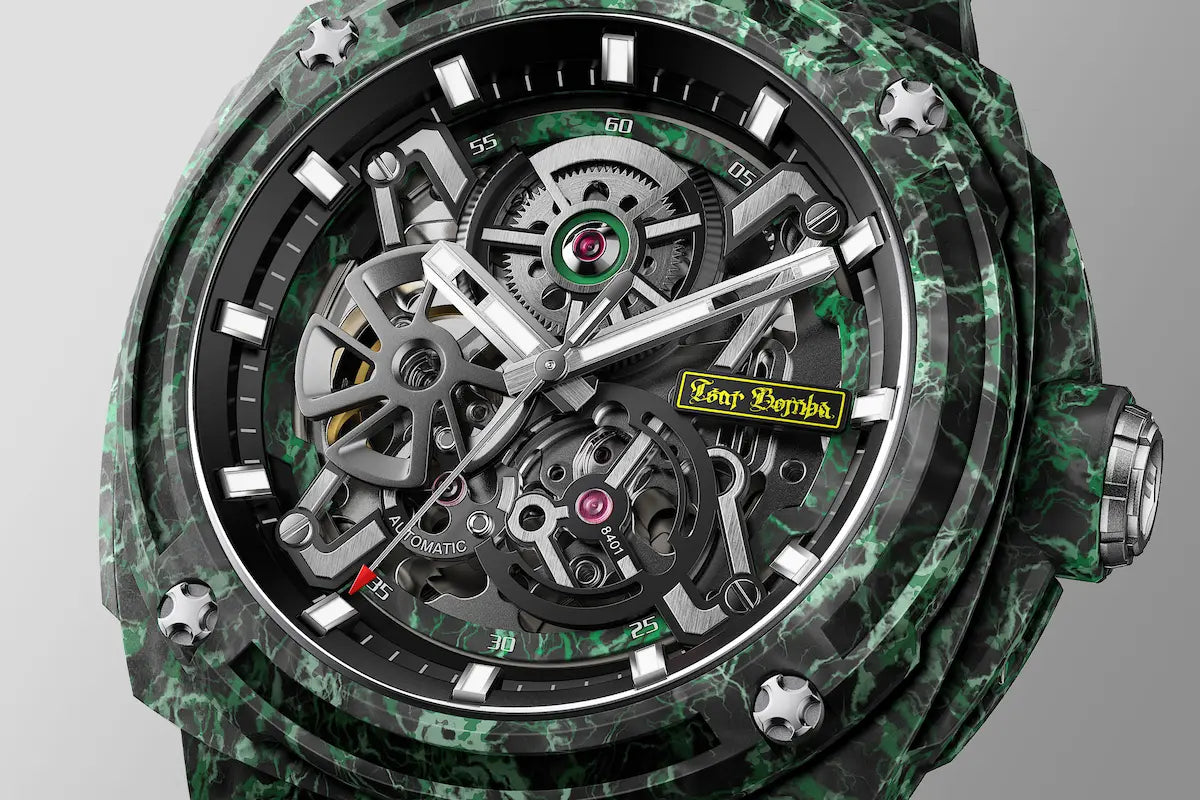 TSAR BOMBA Electron TB8401CF Men’s Watch. Crafted entirely from carbon fiber—including the strap—it weighs just 100 grams. The skeleton dial design offers a direct view of the movement, allowing you to appreciate the charm of precision mechanics in action. Powered by a Citizen MIYOTA movement.-DIAL-disPlay