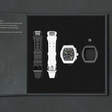 The image shows the TSAR BOMBA Atomic TB8214 interchangeable set. The set includes a black and white fluororubber strap, a black and white fluororubber bezel, and a white and black crown. TSAR BOMBA's patented interchangeable module allows for quick and easy replacement of watch modules without tools, enabling interchangeable straps, crowns, and bezels. Instead of buying multiple watches, why not own one watch that can be styled in various ways?
