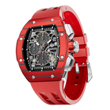The TSAR BOMBA Atommic TB8214CF carbon fiber tonneau quartz watch. carbon fiber red bezel and fluororubber interchangeable red strap.  The Multifunction dial design, the multifunction dial features a chronograph minute sub-dial at the 12 o'clock position, a date display between the 4 and 5 o'clock positions, a seconds sub-dial at the 6 o'clock position, and an hour chronograph sub-dial at the 9 o'clock position. --Left three-quarter-view