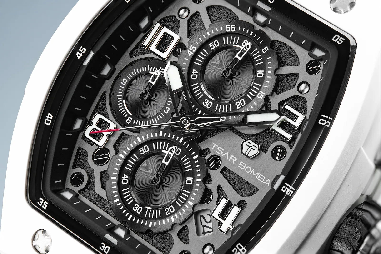 Silver bezel's TB8224B blakc dial display, The Multifunction dial design, the multifunction dial features a chronograph minute sub-dial at the 12 o'clock position, a date display between the 4 and 5 o'clock positions, a seconds sub-dial at the 6 o'clock position, and an hour chronograph sub-dial at the 9 o'clock position.