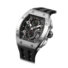 The TSAR BOMBA Elemental TB8224Q stainless steel tonneau quartz watch.silver bezel and black strap.  The Multifunction dial design, the multifunction dial features a chronograph minute sub-dial at the 12 o'clock position, a date display between the 4 and 5 o'clock positions, a seconds sub-dial at the 6 o'clock position, and an hour chronograph sub-dial at the 9 o'clock position. --Left three-quarter angled view