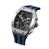 The TSAR BOMBA Elemental TB8224Q stainless steel tonneau quartz watch.silver bezel and blue strap.  The Multifunction dial design, the multifunction dial features a chronograph minute sub-dial at the 12 o'clock position, a date display between the 4 and 5 o'clock positions, a seconds sub-dial at the 6 o'clock position, and an hour chronograph sub-dial at the 9 o'clock position. --Left three-quarter angled view