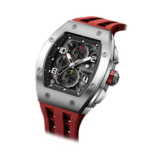 The TSAR BOMBA Elemental TB8224Q stainless steel tonneau quartz watch.silver bezel and red strap.  The Multifunction dial design, the multifunction dial features a chronograph minute sub-dial at the 12 o'clock position, a date display between the 4 and 5 o'clock positions, a seconds sub-dial at the 6 o'clock position, and an hour chronograph sub-dial at the 9 o'clock position. --Left three-quarter angled view