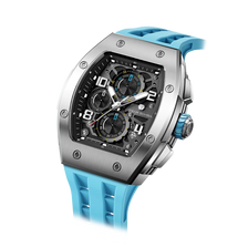 The TSAR BOMBA Elemental TB8224Q stainless steel tonneau quartz watch.silver bezel and sky blue strap.  The Multifunction dial design, the multifunction dial features a chronograph minute sub-dial at the 12 o'clock position, a date display between the 4 and 5 o'clock positions, a seconds sub-dial at the 6 o'clock position, and an hour chronograph sub-dial at the 9 o'clock position. --Left three-quarter-angled-view