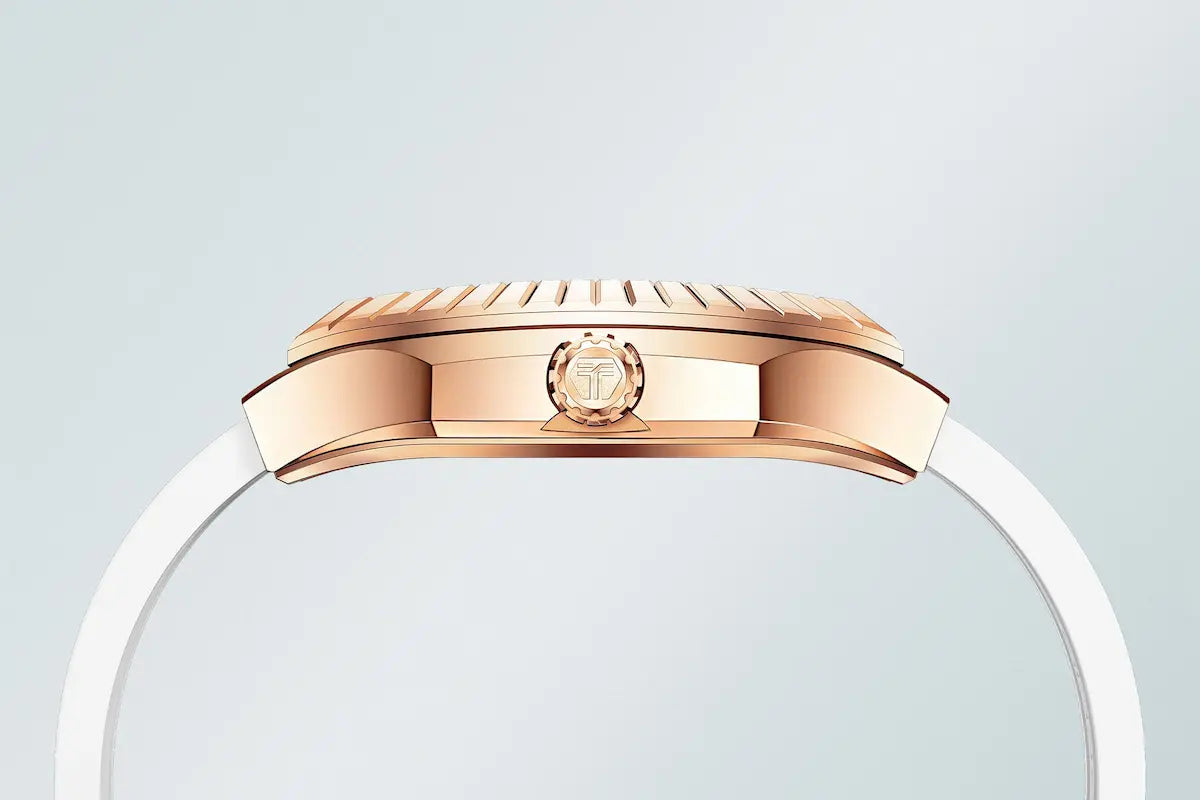 The TB8231L features a tonneau case with a butterfly-shaped cubic zirconia inlay on the dial. It combines a stainless steel case with a fluororubber strap, balancing environmental friendliness and durability. Powered by a Swiss quartz movement, it ensures stable timekeeping. The TB8231L is a fashion tonneau women’s watch that offers exceptional value for money. Rose case abd white strap.